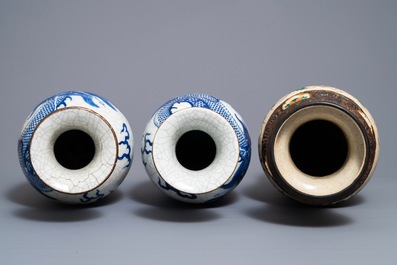 A pair of Chinese Nanking 'dragon' vases and a 'warrior' vase, 19th C.