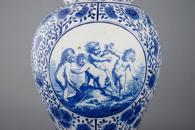 An impressive pair of blue and white Brussels faience covered vases, signed and dated 1861