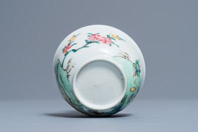 A fine Chinese famille rose cup and saucer with a river scene, Yongzheng