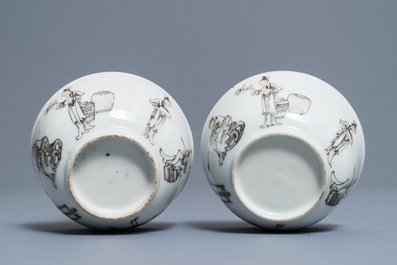A pair of Chinese grisaille and gilt cups and saucers, Qianlong
