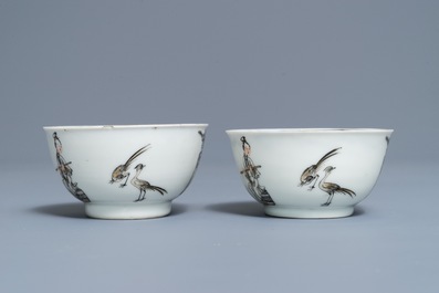 A pair of Chinese grisaille and gilt cups and saucers, Qianlong