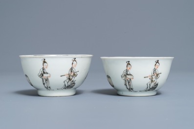 A pair of Chinese grisaille and gilt cups and saucers, Qianlong