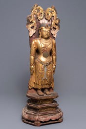 A large Chinese gilt and painted wood figure of Buddha, 19th C.