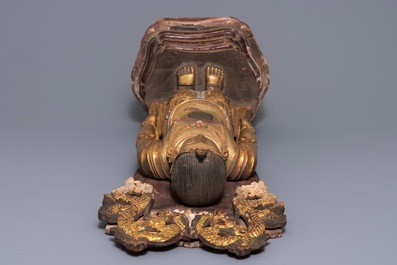 A large Chinese gilt and painted wood figure of Buddha, 19th C.