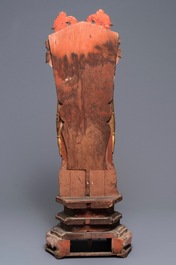 A large Chinese gilt and painted wood figure of Buddha, 19th C.