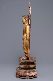 A large Chinese gilt and painted wood figure of Buddha, 19th C.