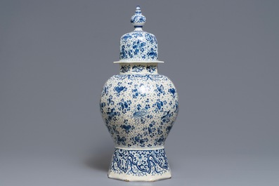 A large Dutch Delft blue and white vase and cover, early 18th C.