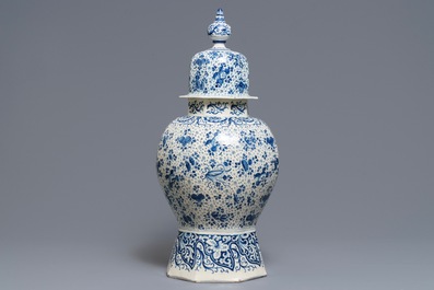 A large Dutch Delft blue and white vase and cover, early 18th C.