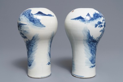 A pair of Chinese blue and white landscape vases, 19/20th C.