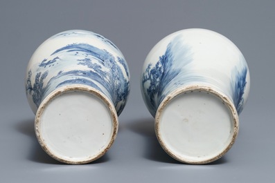 A pair of Chinese blue and white landscape vases, 19/20th C.