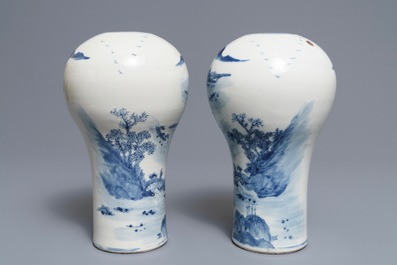 A pair of Chinese blue and white landscape vases, 19/20th C.