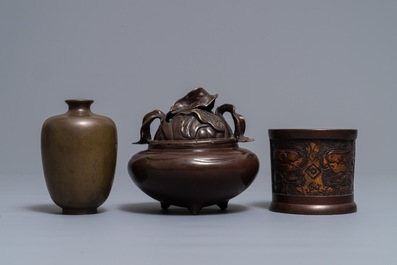 A Japanese inlaid bronze vase, a bronze censer and a parcel-gilt copper brush pot, Meiji, 19th C.