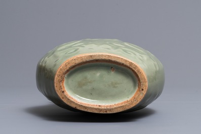 A Chinese Longquan celadon 'dragon' vase, Ming