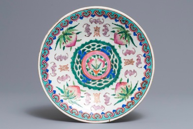 A Chinese blue and white incense burner and a famille rose dish, 19th C.