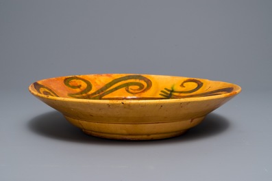 Alfred William Finch (1854 &ndash;1930): An Art Nouveau yellow- and ochre-glazed pottery dish