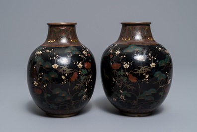 A pair of Japanese cloisonn&eacute; 'butterfly' vases, Meiji, 19th C.