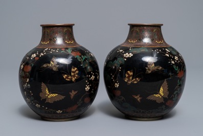 A pair of Japanese cloisonn&eacute; 'butterfly' vases, Meiji, 19th C.