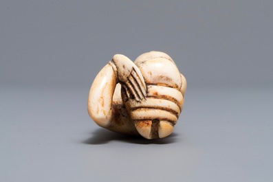 A Chinese carved ivory 'doctor's lady', Ming or early Qing