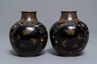 A pair of Japanese cloisonn&eacute; 'butterfly' vases, Meiji, 19th C.