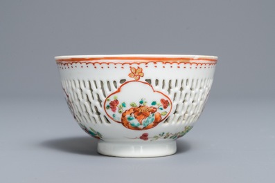 A Chinese grisaille vase, a famille rose 'mandarin' teapot and a reticulated cup on saucer, Yongzheng/Qianlong