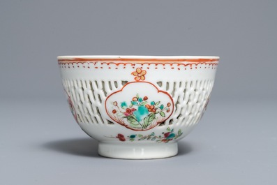 A Chinese grisaille vase, a famille rose 'mandarin' teapot and a reticulated cup on saucer, Yongzheng/Qianlong