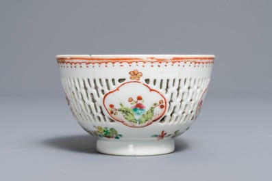 A Chinese grisaille vase, a famille rose 'mandarin' teapot and a reticulated cup on saucer, Yongzheng/Qianlong