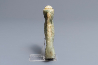 A Mughal-style carved celadon jade sword hilt, India, 19/20th C.