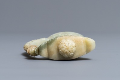 A Mughal-style carved celadon jade sword hilt, India, 19/20th C.