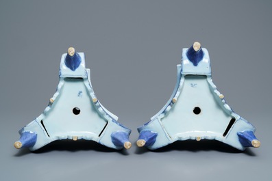 A pair of Dutch Delft blue and white candlestick bases, 17th C.