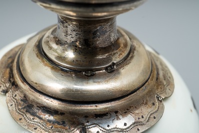 A Chinese iron red and overglaze black silver-mounted vase, 19th C.