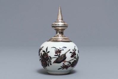 A Chinese iron red and overglaze black silver-mounted vase, 19th C.