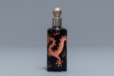 A Chinese silver-mounted famille noire 'dragon' snuff bottle, Qianlong/Jiaqing