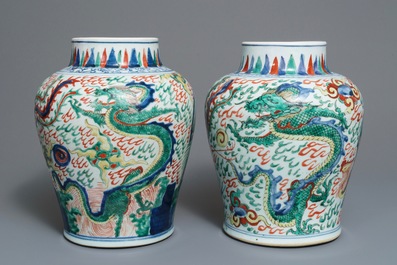 A pair of Chinese wucai &lsquo;dragon and phoenix&rsquo; vases, Transitional period