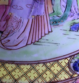 A Chinese famille rose plate with figures in a garden, Yongzheng