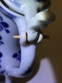 A Chinese blue and white jug and cover after a pewter example, Kangxi