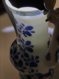 A Chinese blue and white jug and cover after a pewter example, Kangxi