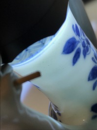 A Chinese blue and white jug and cover after a pewter example, Kangxi