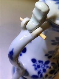 A Chinese blue and white jug and cover after a pewter example, Kangxi