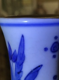 A Chinese blue and white double gourd vase, Transitional period