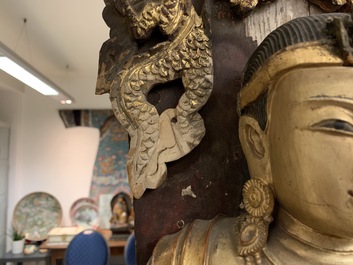 A large Chinese gilt and painted wood figure of Buddha, 19th C.