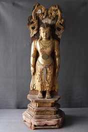 A large Chinese gilt and painted wood figure of Buddha, 19th C.