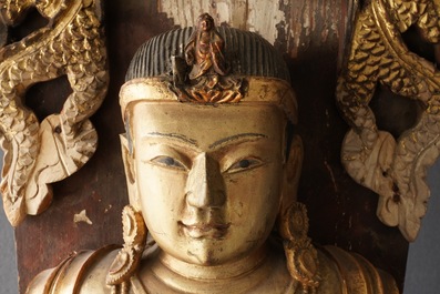 A large Chinese gilt and painted wood figure of Buddha, 19th C.