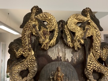A large Chinese gilt and painted wood figure of Buddha, 19th C.