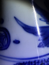 A Chinese blue and white double gourd vase, Transitional period
