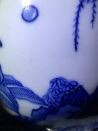 A Chinese blue and white double gourd vase, Transitional period