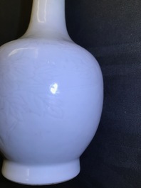 A Chinese blanc de Chine bottle vase with incised anhua design, ca. 1900