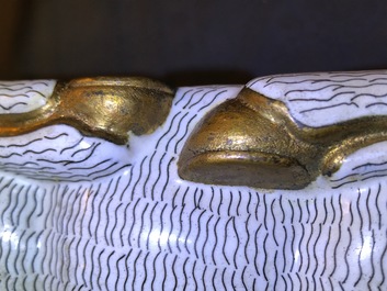 A pair of Chinese cloisonn&eacute; and gilt bronze models of rams, Qianlong