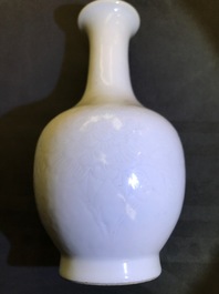 A Chinese blanc de Chine bottle vase with incised anhua design, ca. 1900
