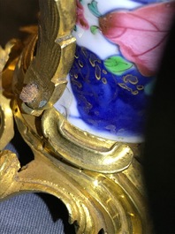 Four Chinese ormolu-mounted famille rose 'tobacco leaf' vases remodeled as two, Qianlong