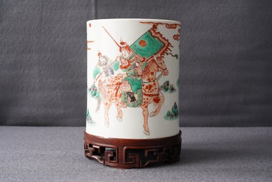 A Chinese famille verte brush pot on wooden stand, Kangxi